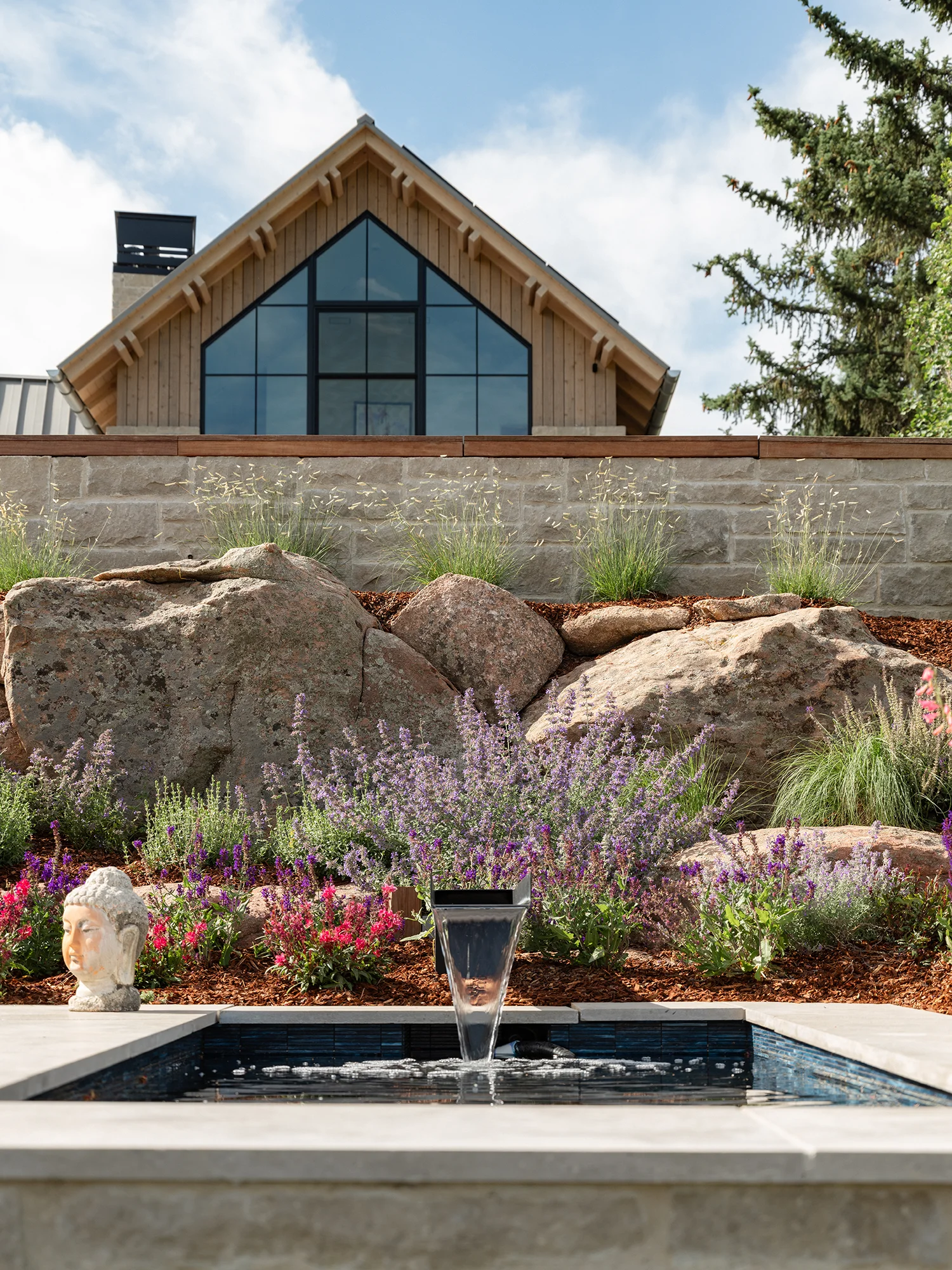 A residential landscape designed by Green Landscape Solutions and photographed by Dane Cronin.